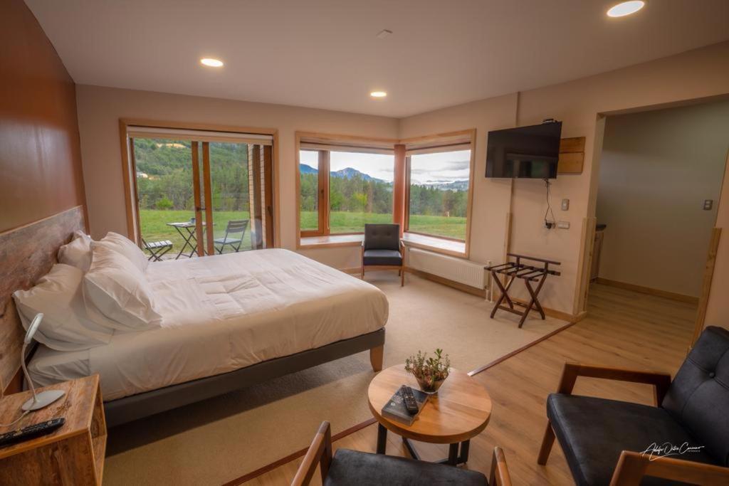 Calafate Apart Hotel Coyhaique Bagian luar foto